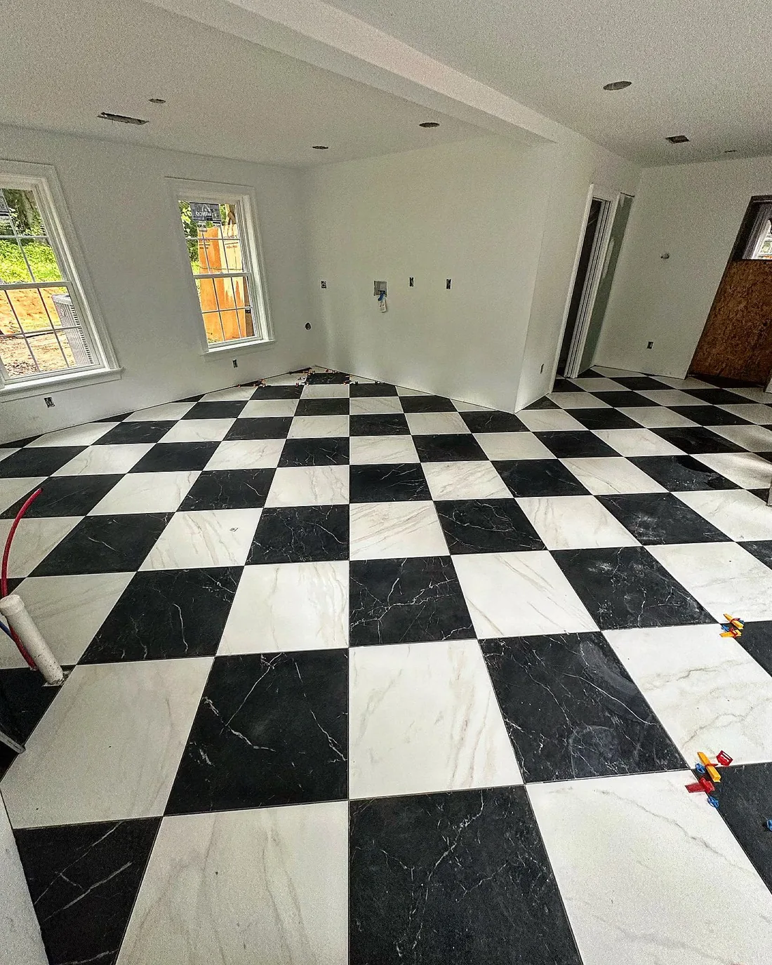 Black and white checkered tile floor.